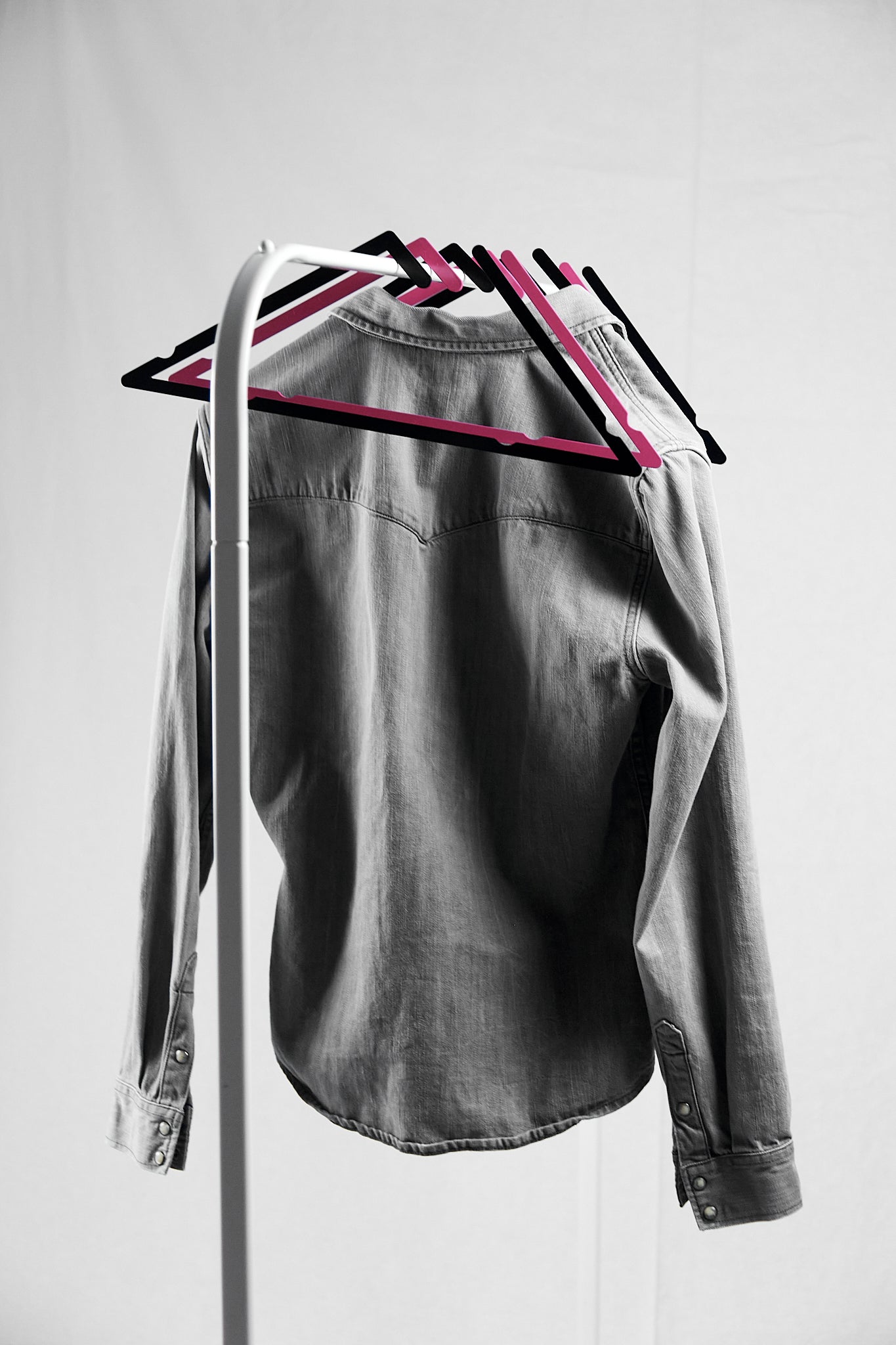 Artistic coat hangers made from recycled steel
